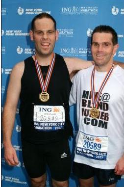 Michael and Gavin wearing medals at the end of the New York Marathon November 4 2007 photo