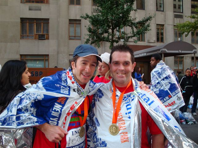 Mike and Harris at the finish of the New York City Marathon 2009 photo. Click to enlarge